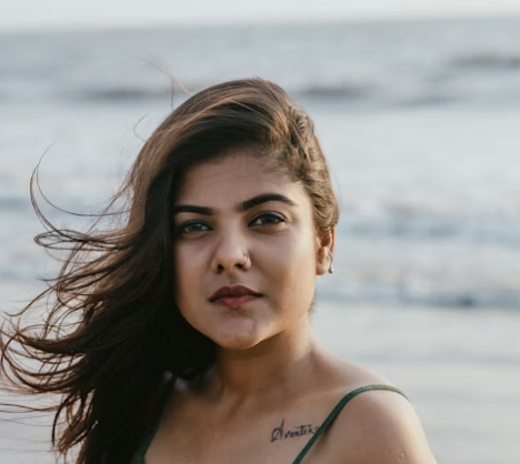 Woman by sea portrait